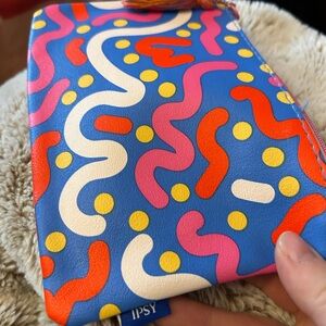 ipsy Blue Cosmetic Bag with Pink, Red, Yellow & Cream Abstract Design